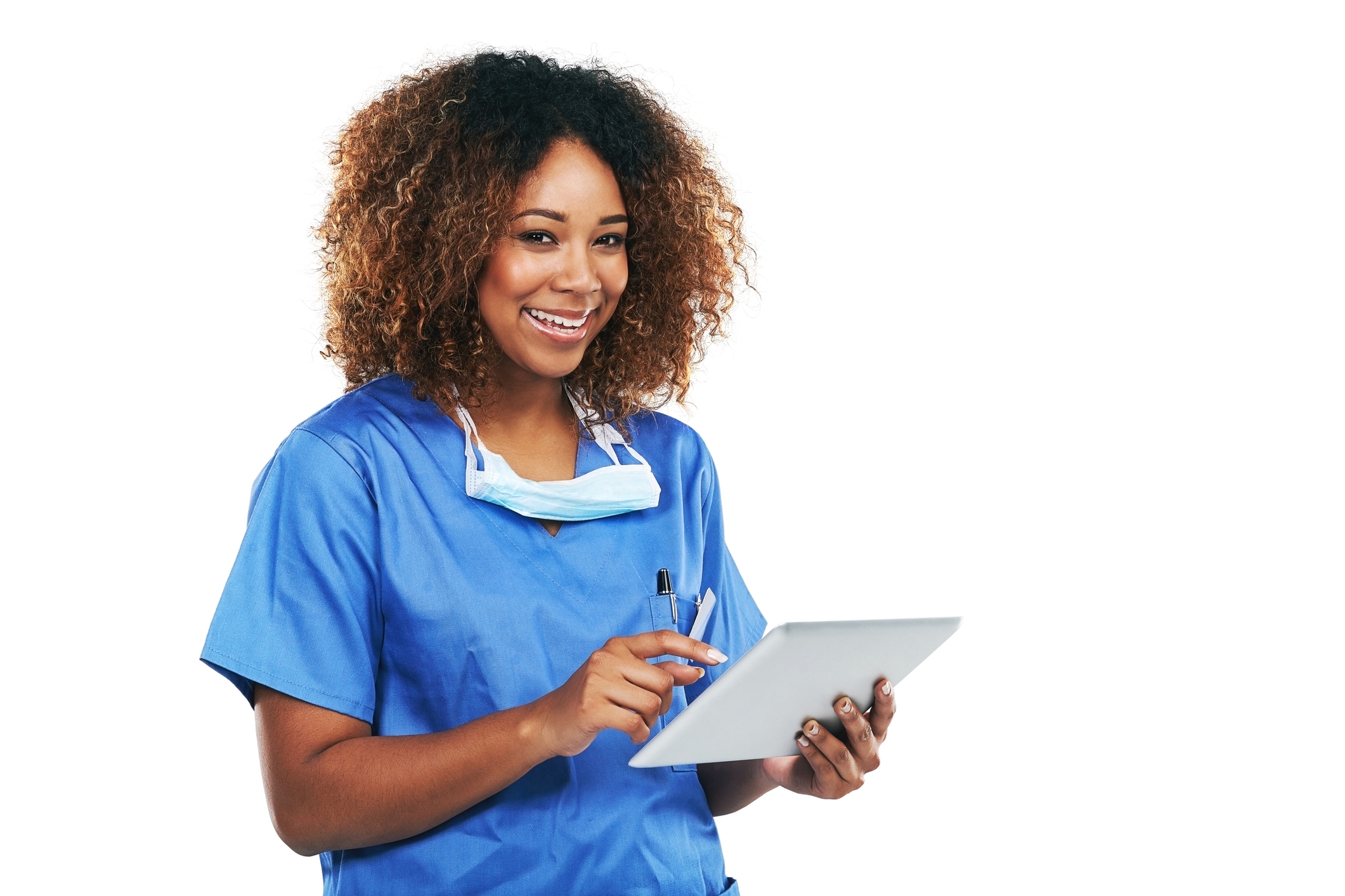 Studio portrait of an attractive young nurse using a digital tablet against a white background